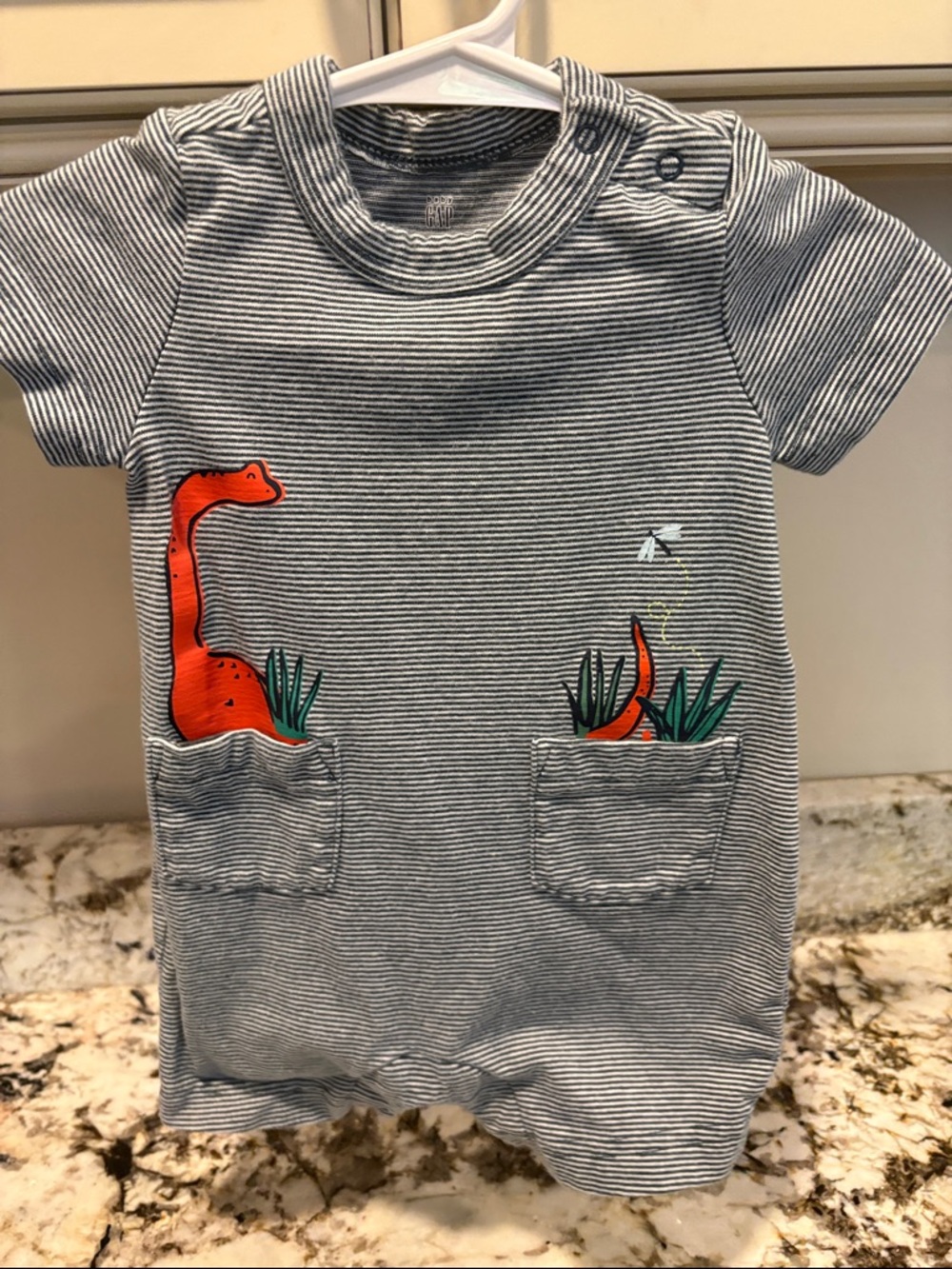 GAP Striped Short-Sleeve Romper with Orange Dino Pockets
